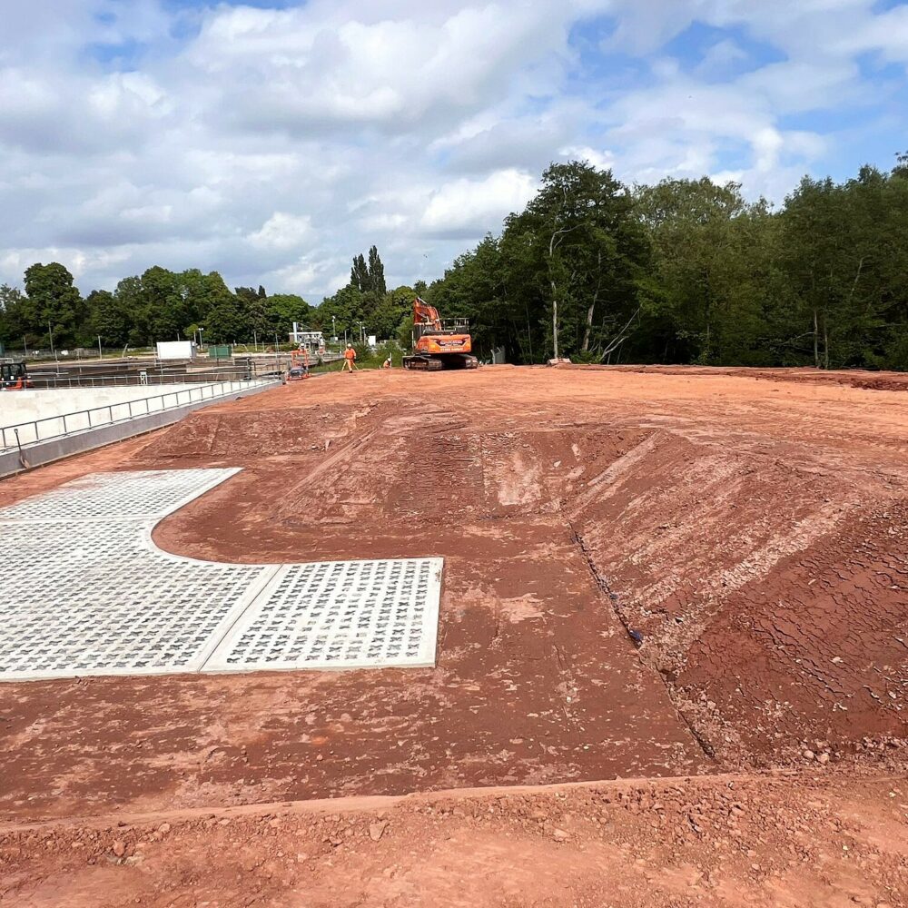Continuing shaping edges and levelling ground